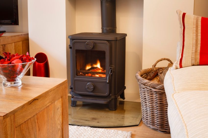 Cozy modern interior living room with wood burner