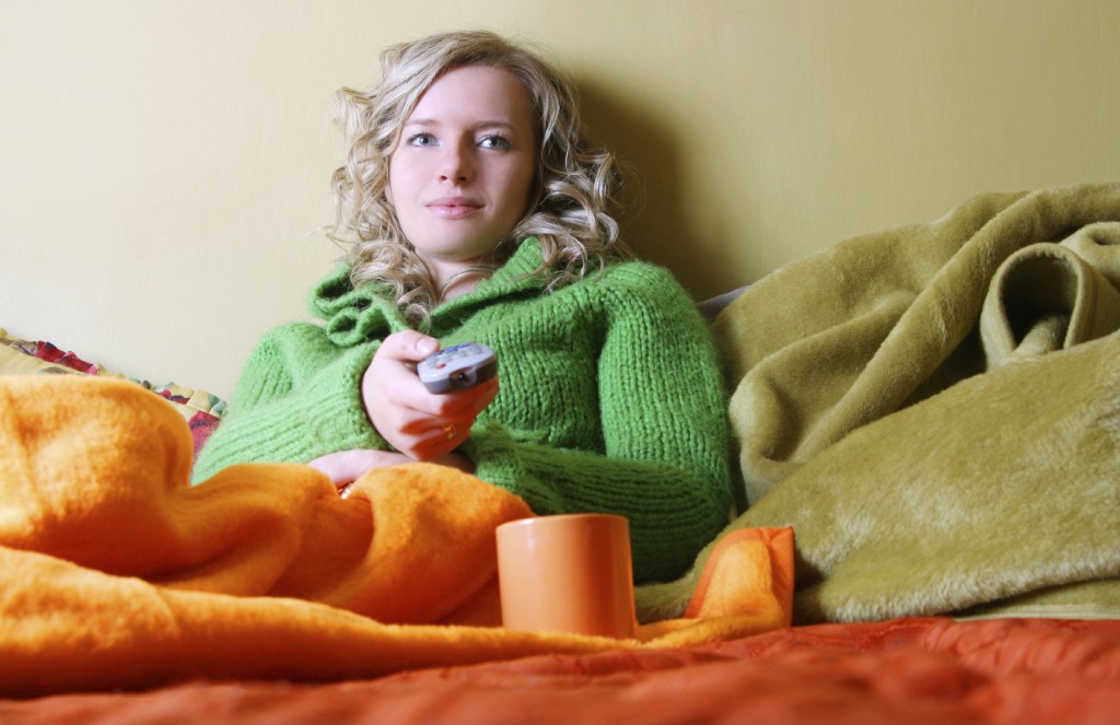 cold woman and tv iStock_000005256805_Medium