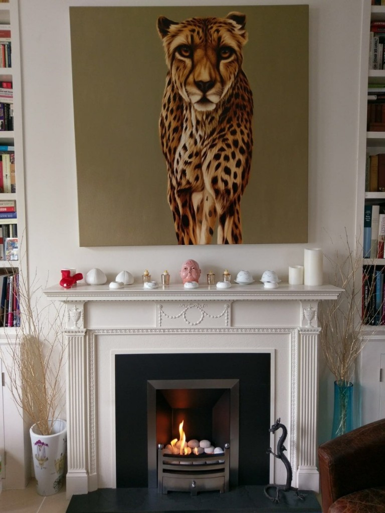 A simple yet effective piece of canvas art above a fireplace