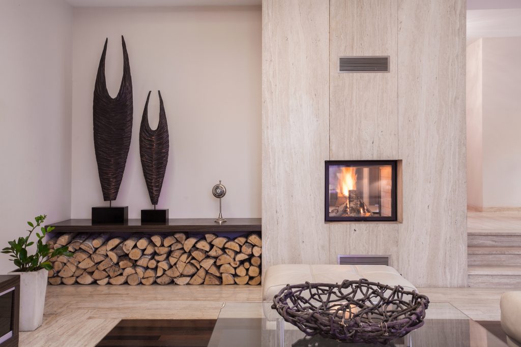 Modern fireplace with wood in the living room