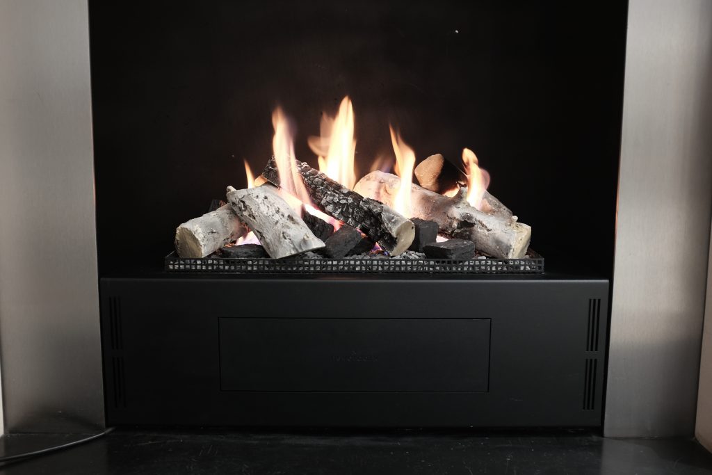 Image of a neverdark bioethanol burner in a modern fireplace